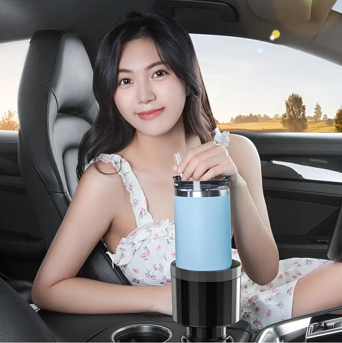 Matte black adjustable car cup holder expander for oversized water bottles and travel cups.