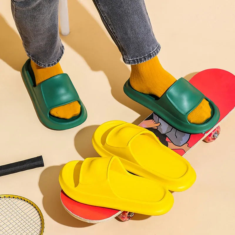 Thick sole EVA flip flop slippers in multiple colours on a white background.
