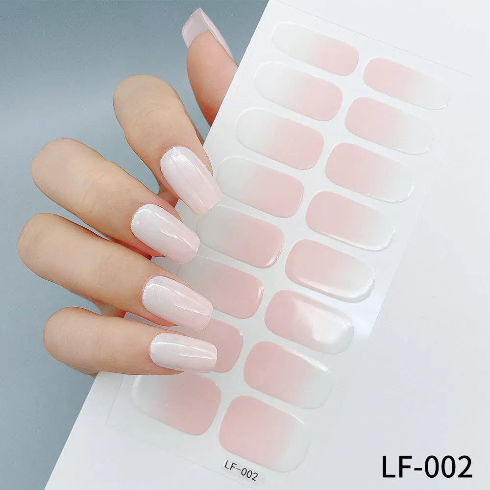 Sheet of 16 solid colour nail art sticker designs including cross, rose, and leopard print patterns.