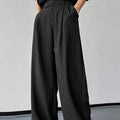 Black men's trousers with vertical stripes and front pleats in rabbit hair bamboo fibre fabric
