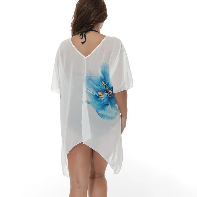 White plus size loose fit beach cover-up blouse for women, shown as swimwear cover.