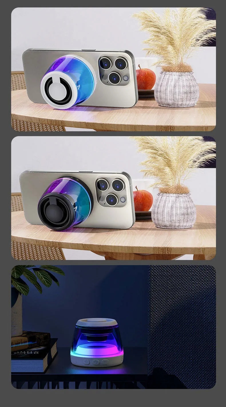 Black and white portable Bluetooth speaker with magnetic base and ambient lighting on desktop