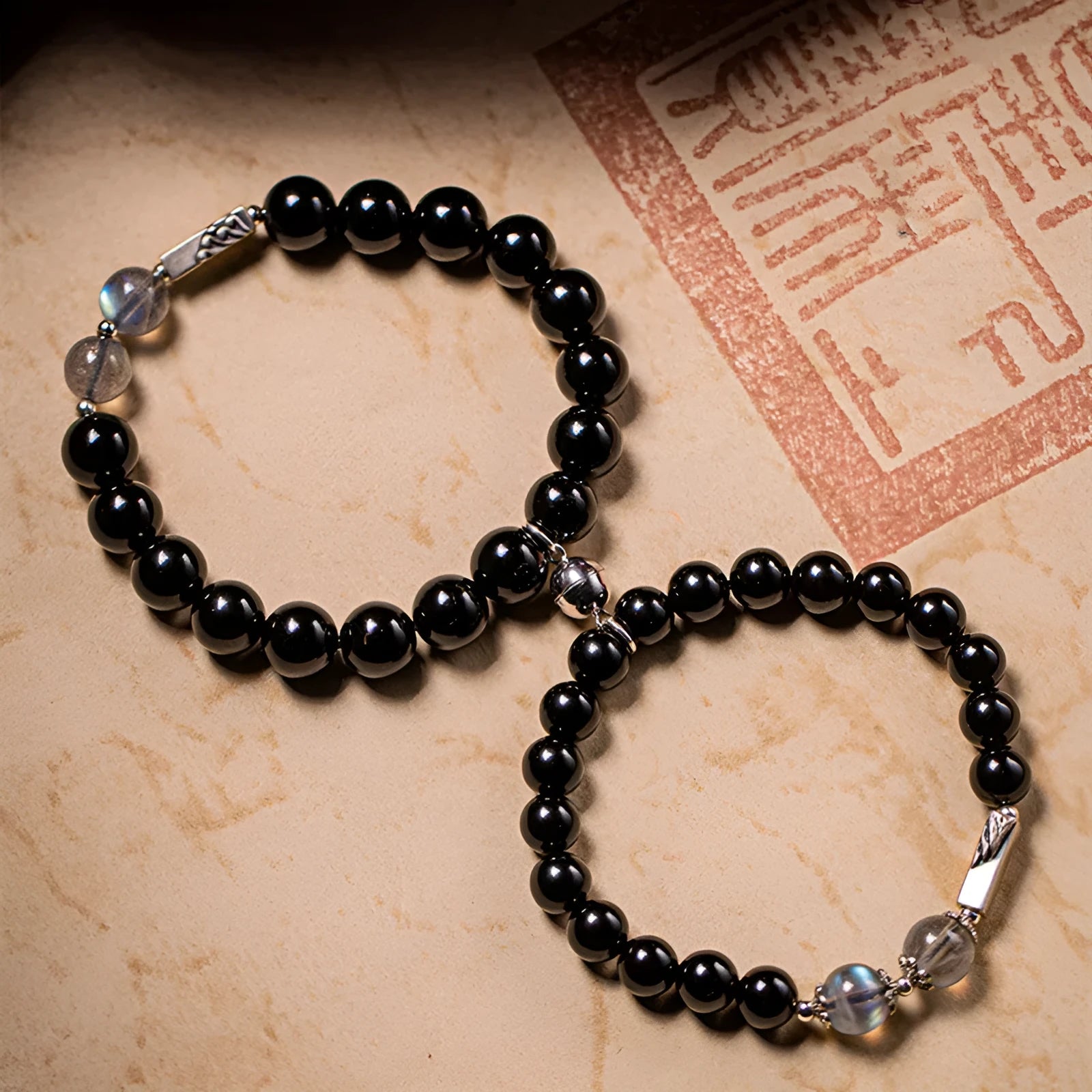 Obsidian Buddha beads DIY couple bracelet kit showing 8mm and 10mm beads with national style design