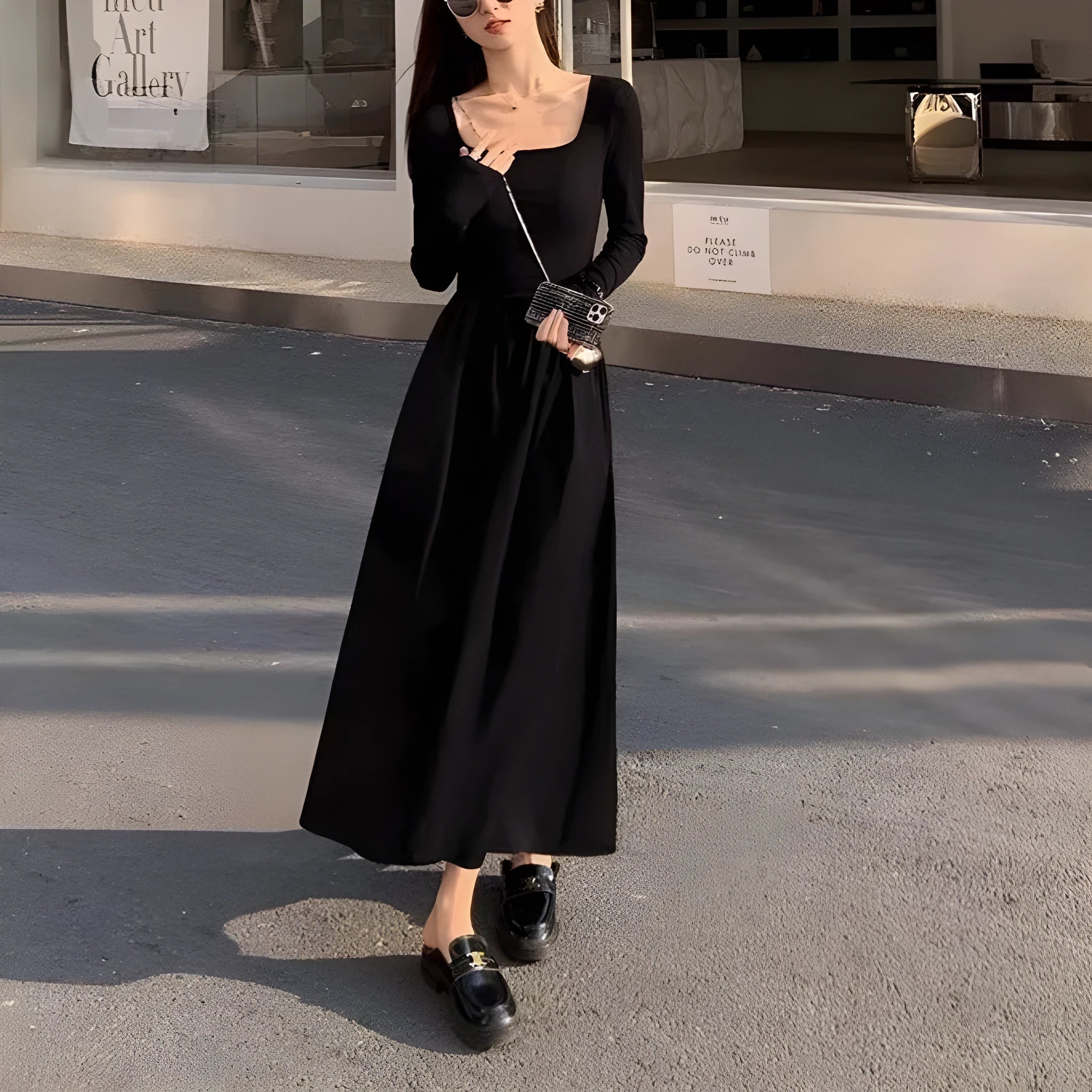 Women's black square collar knitted A-line dress with long sleeves and elastic waist