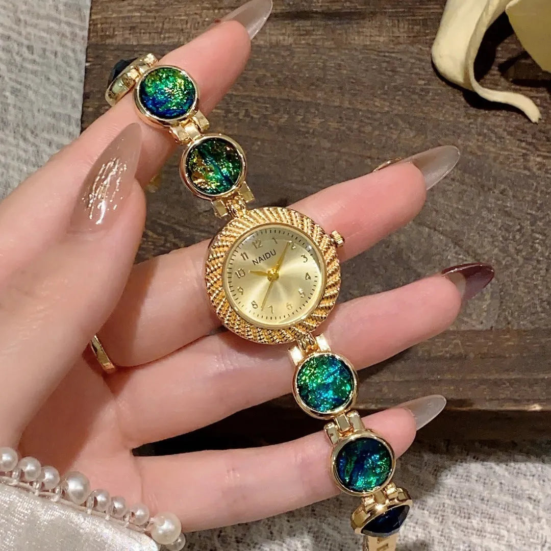 Women's quartz watch with 25mm round dial and zinc alloy case in multiple colour options