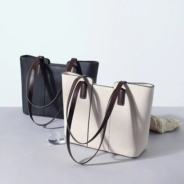 Genuine leather women's commuter shoulder bag in box-type shape with sewing line detailing and mobile phone compartment