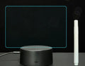 3D acrylic LED message board with stylus pen on illuminated base showing handwritten note