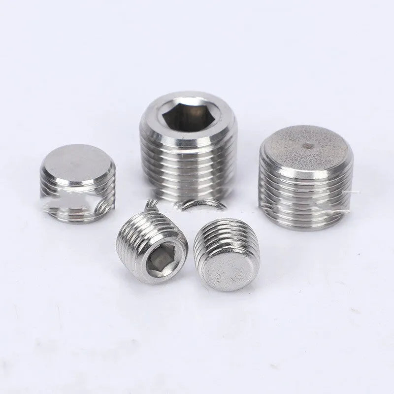 Stainless steel hexagonal plug with brass washer for 3/8 inch BSPP thread bulkhead fitting.