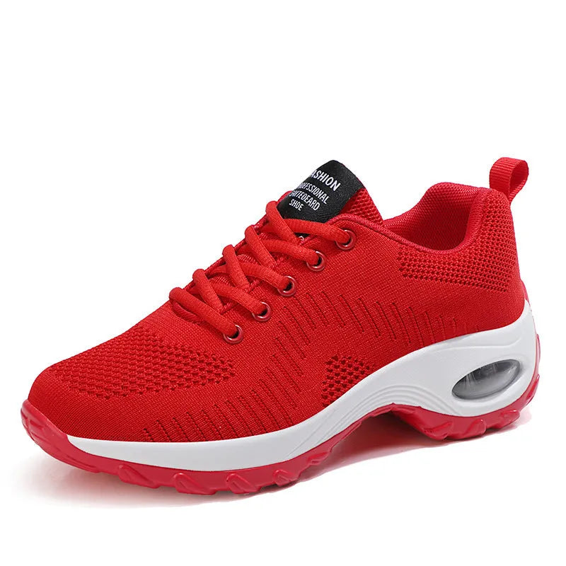 Women's red and black mesh low top sneakers with front lace-up and round toe design