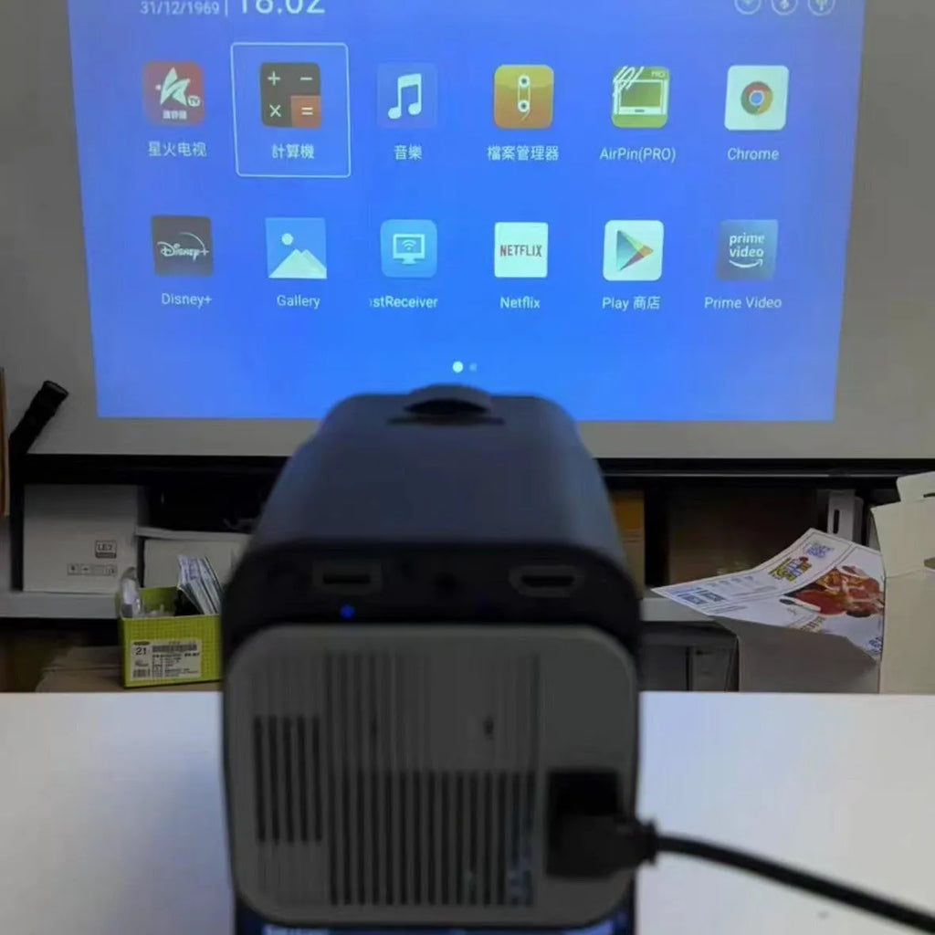 720p HD wireless home projector for gaming and screen projection on a table.