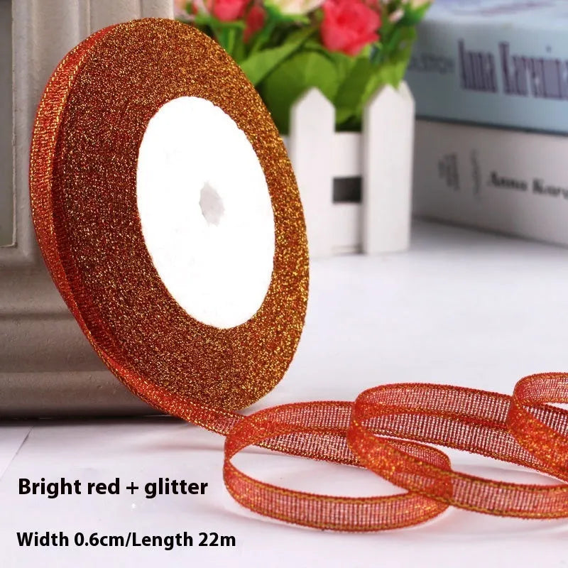 Roll of polyester gift ribbon showing 0.6cm width and multiple colour options including metallic finishes
