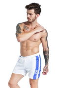 Men's blue lace-up sports shorts with slim fit design and polyester construction