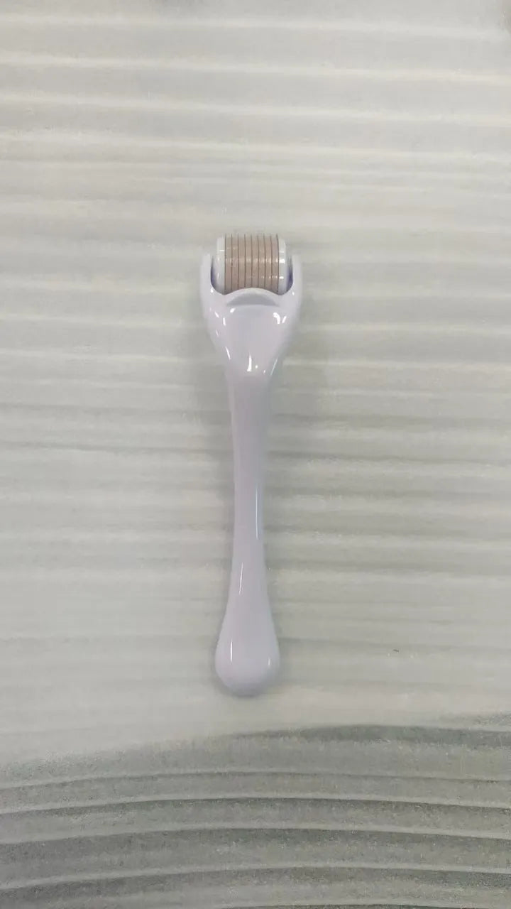 540 micro needle dermaroller roller with black handle and coloured wheel showing needle specification