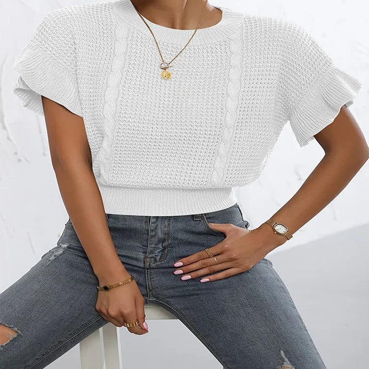 Loose white knitted pullover sweater with detailed twisted string ruffled short sleeves, round neck.