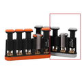 Grey and orange portable silicone finger trainer for musician hand muscle development.