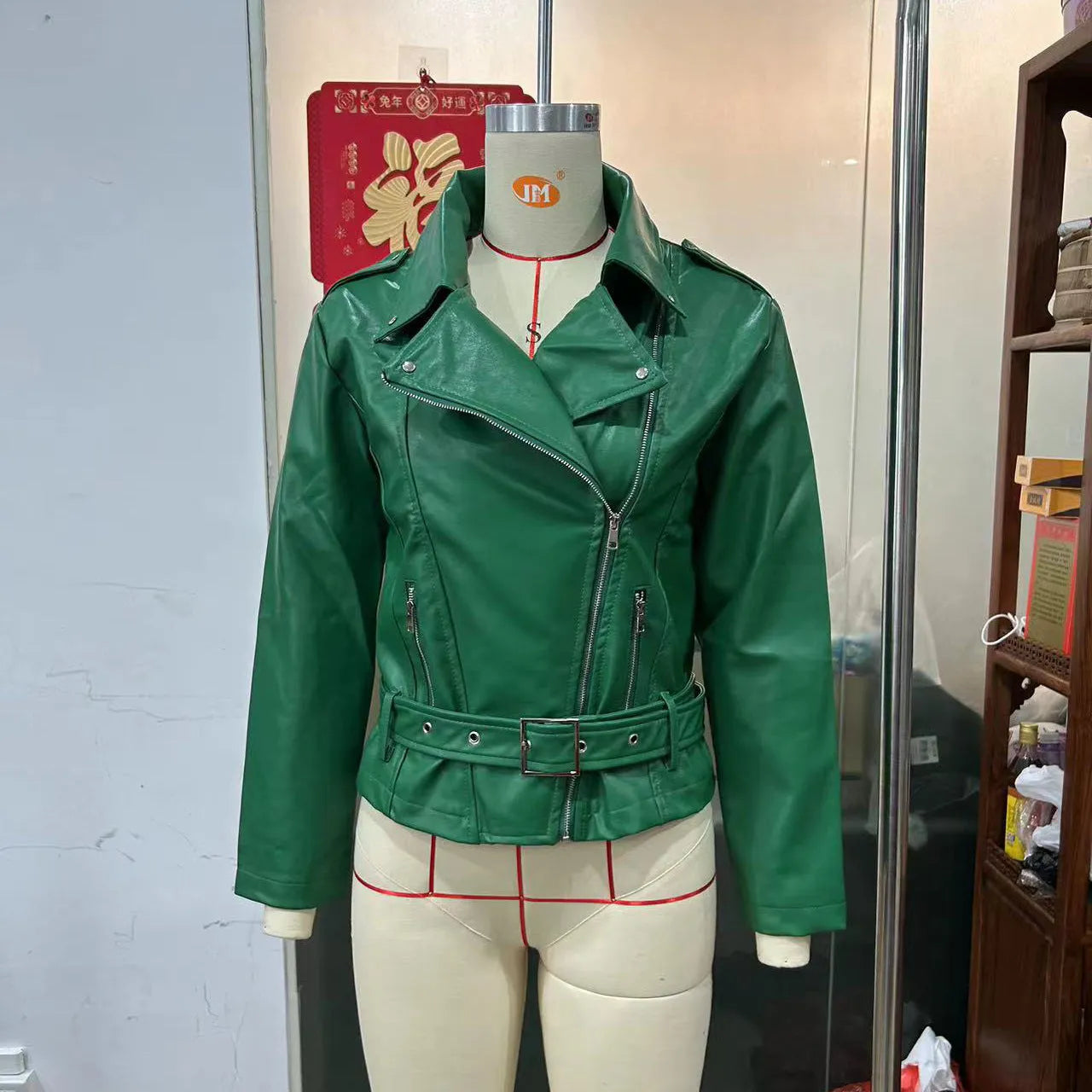 Women's punk short belt lapel jacket in polyester leather with drawstring waist and Peter Pan collar