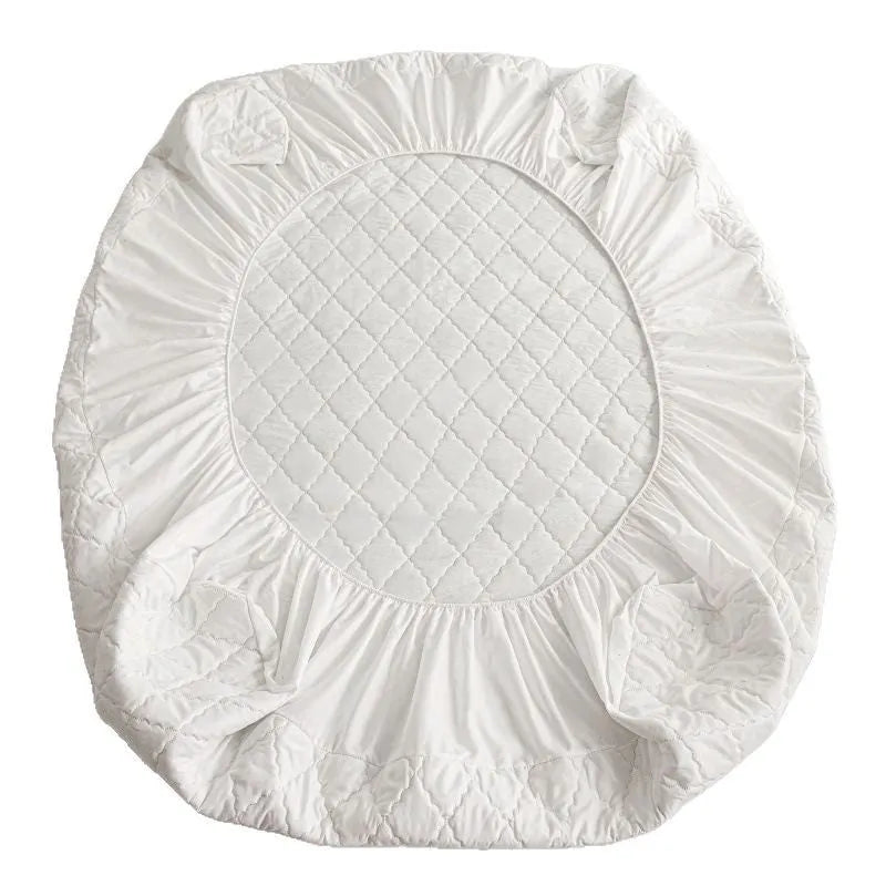 Diamond lattice quilted waterproof mattress protector set with bamboo fibre fitted sheet and pillowcases.