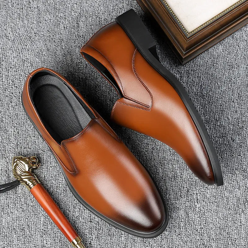 Men's black leather slip-on business casual shoes with rubber sole and low top design