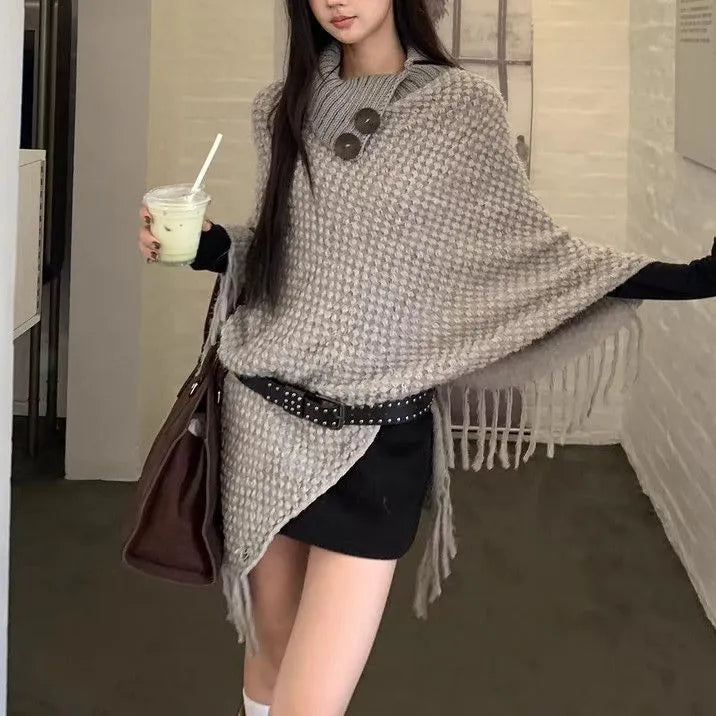 Women's triangle shawl cape in cashmere-acrylic blend with tassel detailing and plush texture