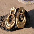 Double circle French retro earrings in quicksand gold colour with copper construction and U-shaped design
