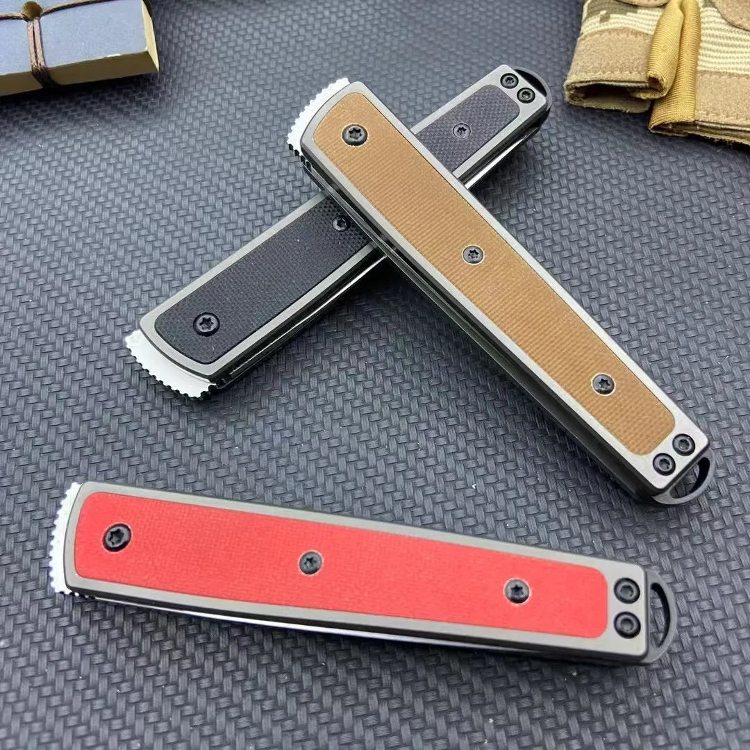 Closed and open views of a black folding fruit knife showing blade and handle.