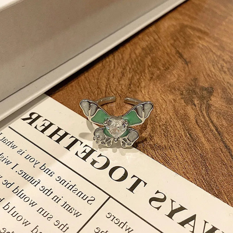 Copper women's ring featuring a creative Chinese butterfly design, available in multiple colours.