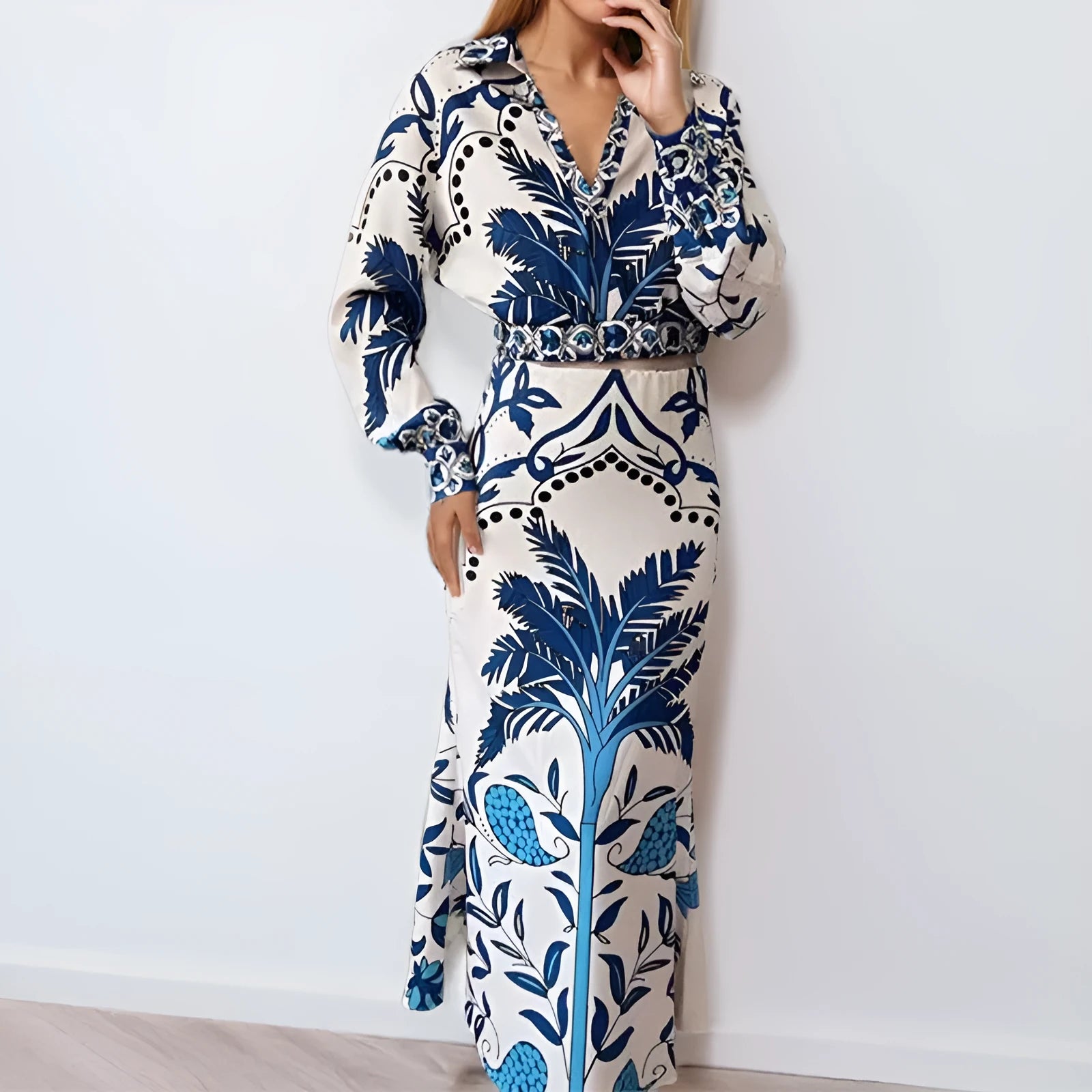 Women's early spring casual fashion set with flower print design showing long sleeve top and matching long skirt