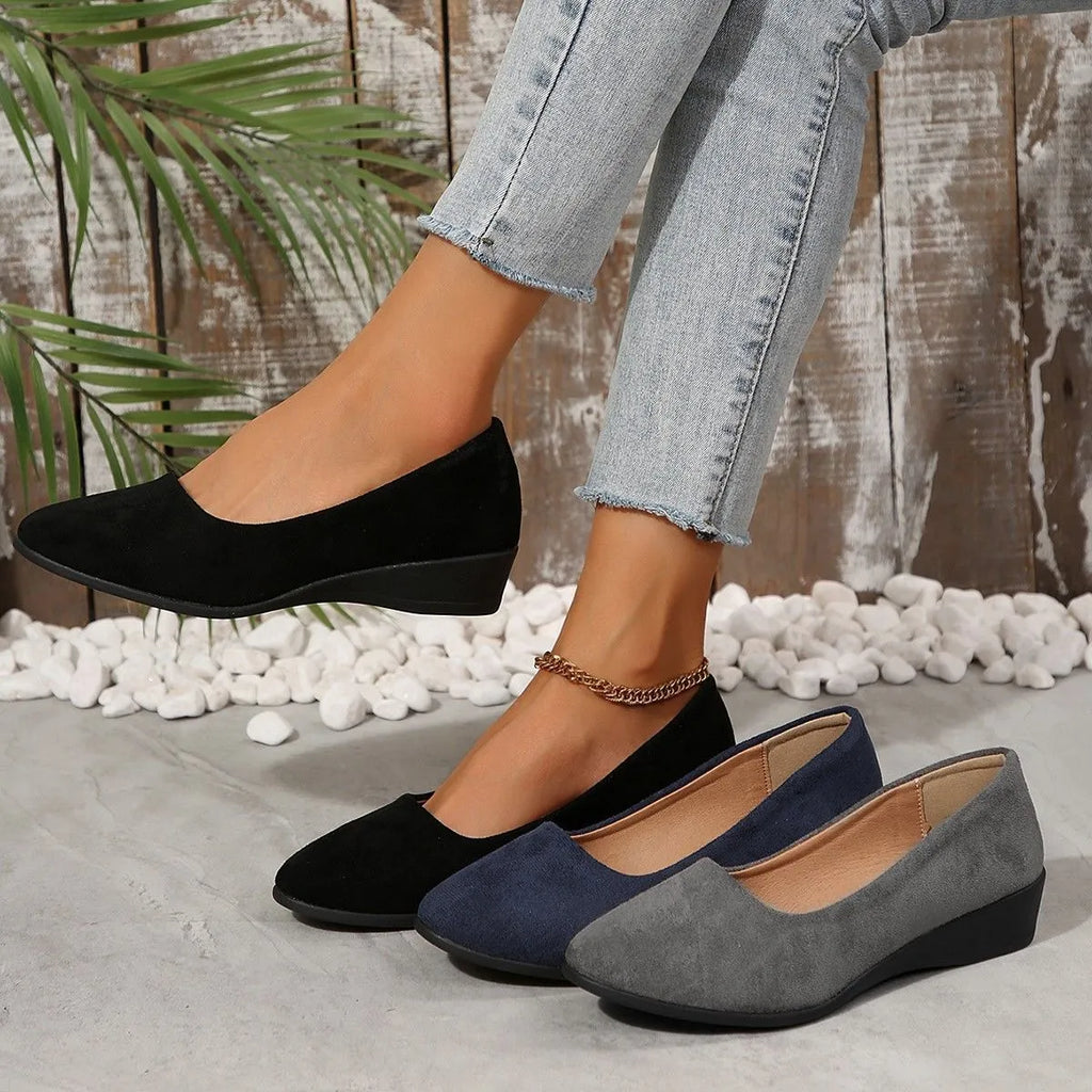 Women's pointed toe wedge pumps with suede upper and shallow mouth cut in light brown