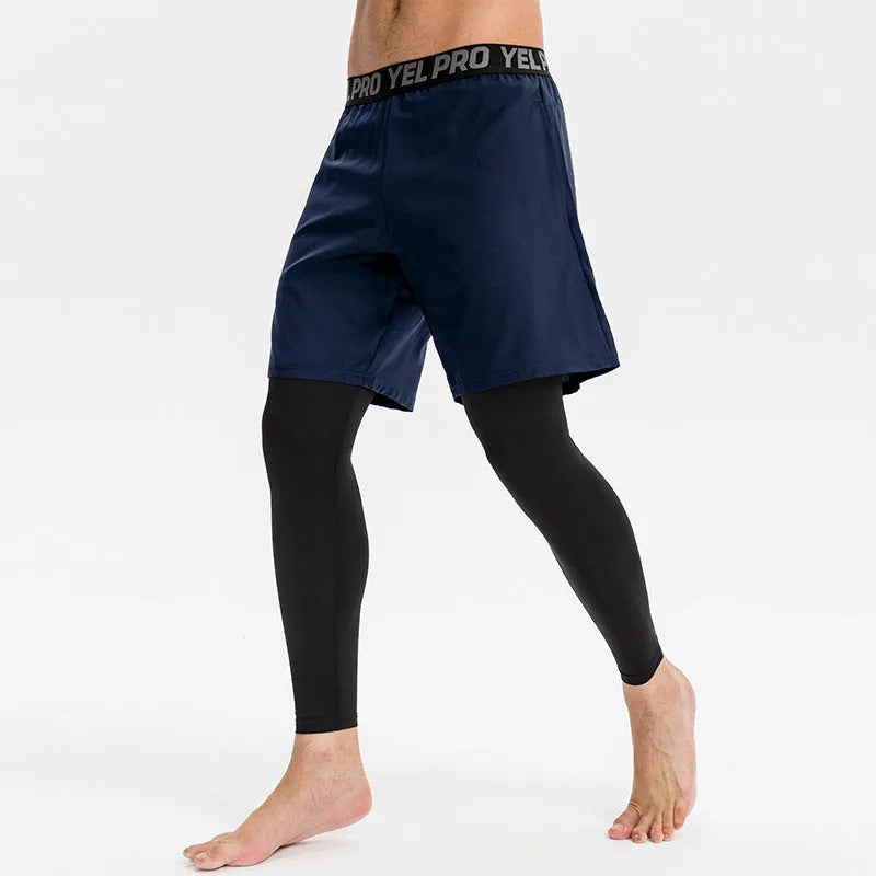 Man wearing grey elastic quick-drying sports trousers for fitness exercise.
