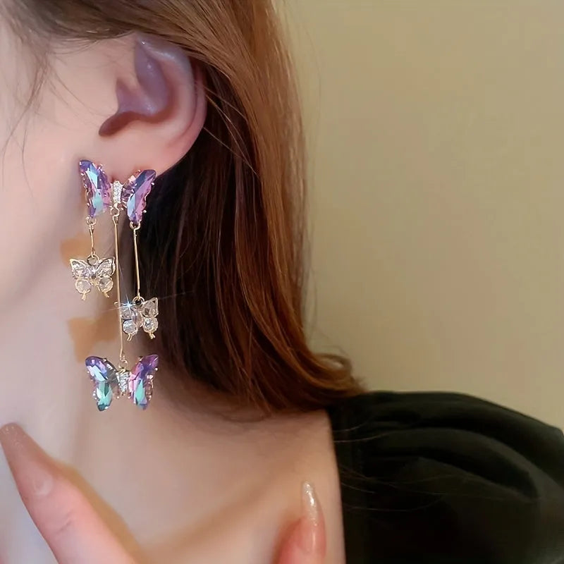 Silver needle crystal flowers butterfly tassel earrings with blue purple electroplated finish