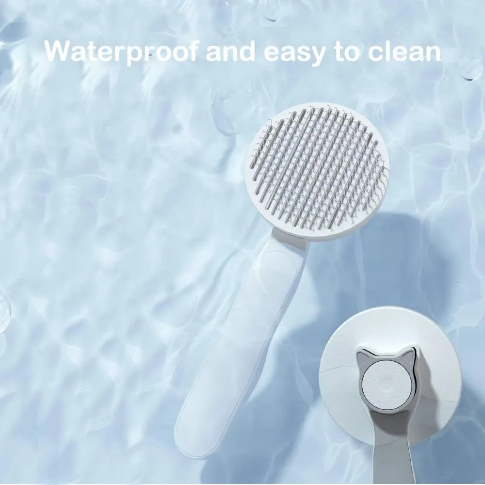 Blue self-cleaning cat brush with a rubber handle and round-tipped metal pins.
