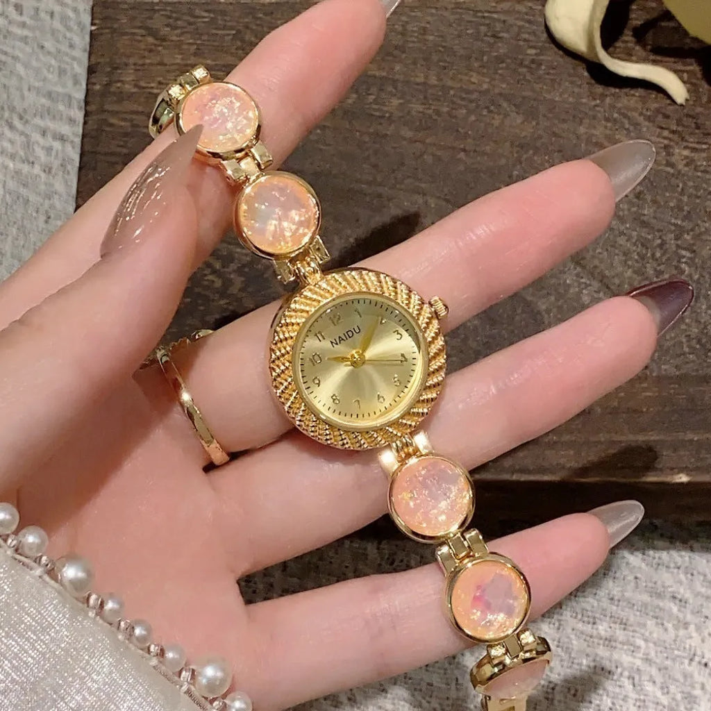 Women's quartz watch with 25mm round dial and zinc alloy case in multiple colour options