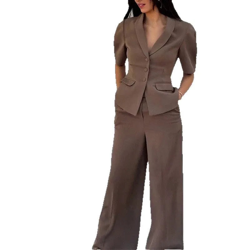Brown slim fit two-piece suit with long sleeves and matching trousers on a hanger.