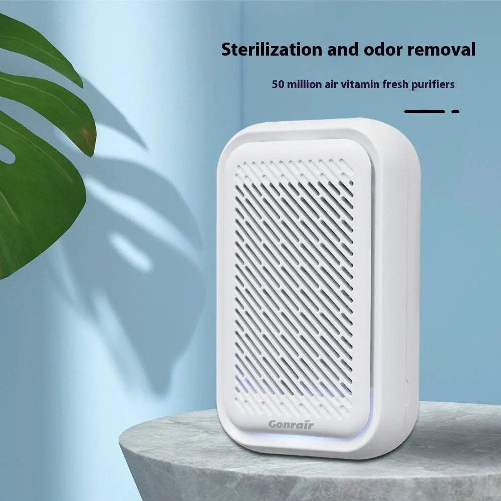 White wall-mounted air purifier with direct plug-in power cord for rooms under 10 square metres