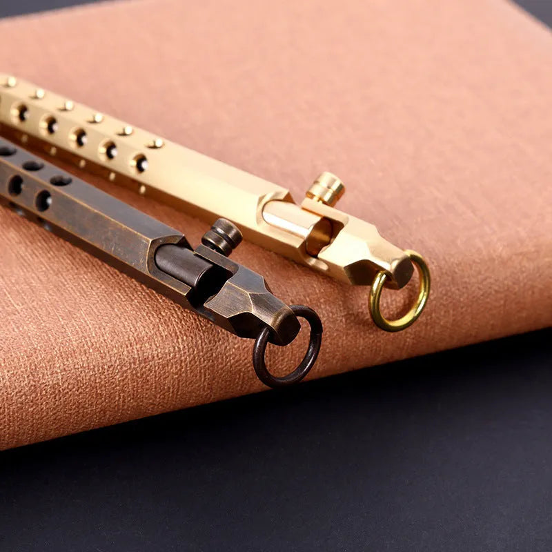 Brass hexagonal bolt pen showing six-sided shape and metallic construction with 0.5mm writing head