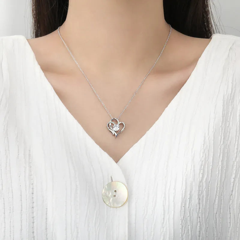 Simple heart-shaped women's necklace in 925 silver with choice of rose gold, platinum, or yellow gold plating.