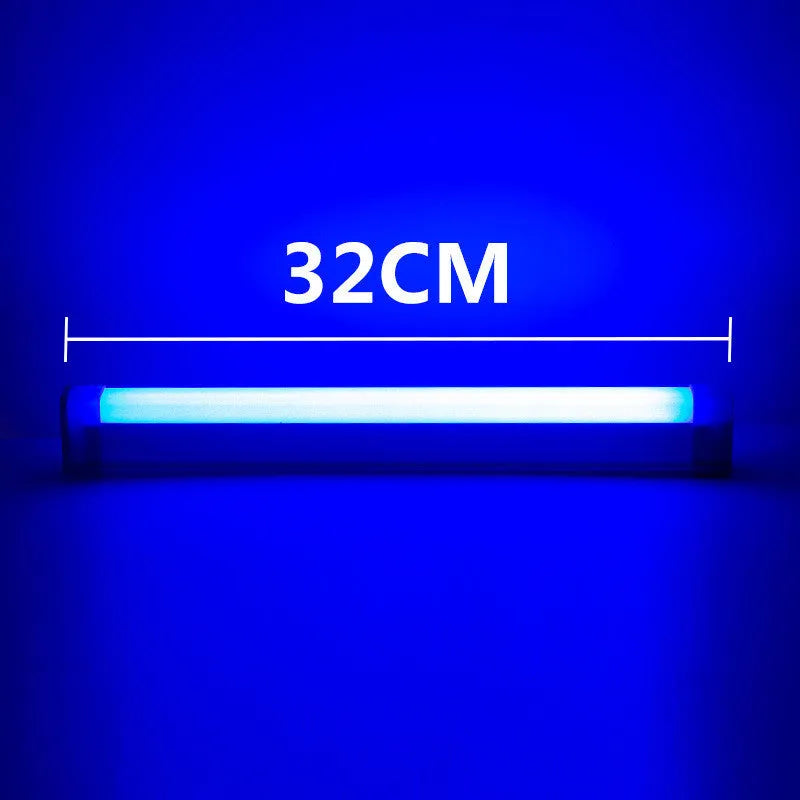 Blue and purple rechargeable LED tube light with USB cable on a dark background.