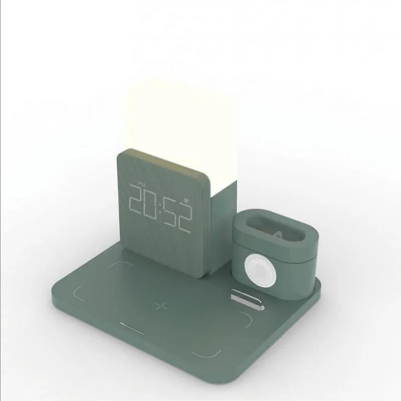 A dark green 3-in-1 Qi wireless charging stand on a desk, showing its foldable design and charging pad.