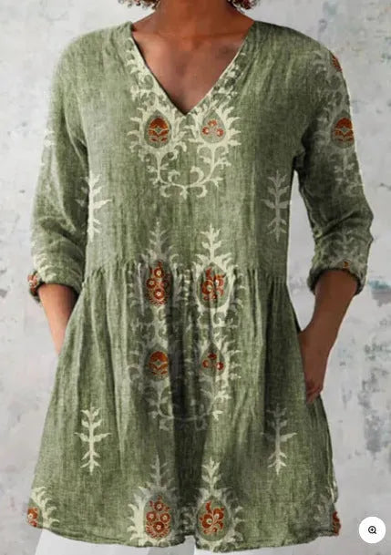 Women's printed floral dress with loose fit, wide waist, and 3/4 ruffle sleeves