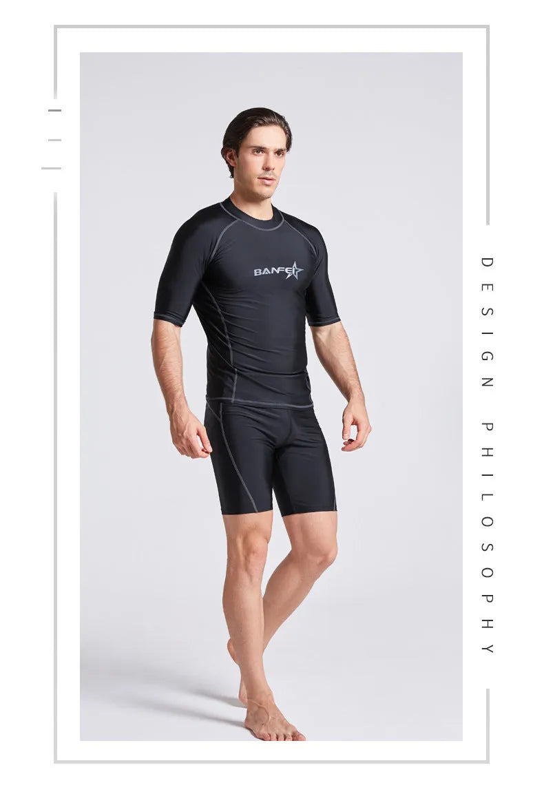 Men's quick-drying half sleeve swim suit with separate swim top and pants in navy blue.
