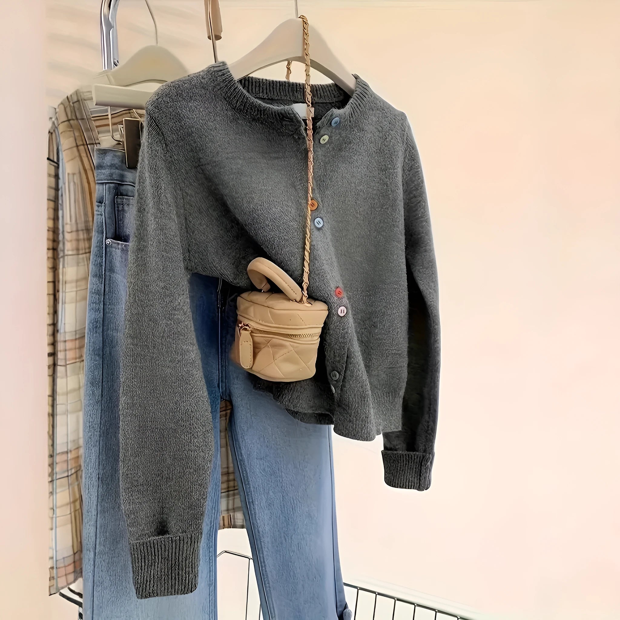 Dark grey women's cardigan sweater with button front and regular sleeve length