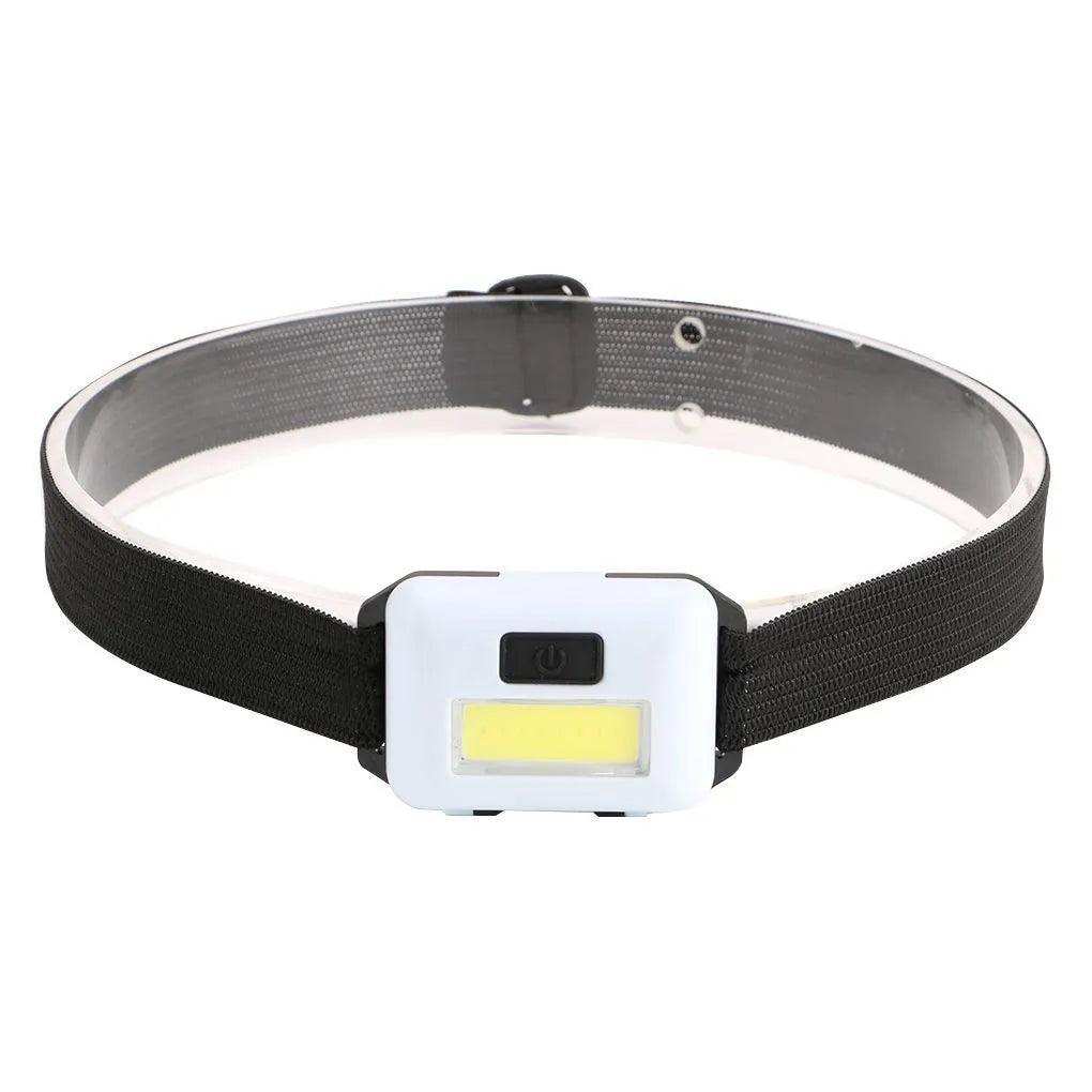 Compact blue outdoor LED headlight with adjustable head strap on a black background.