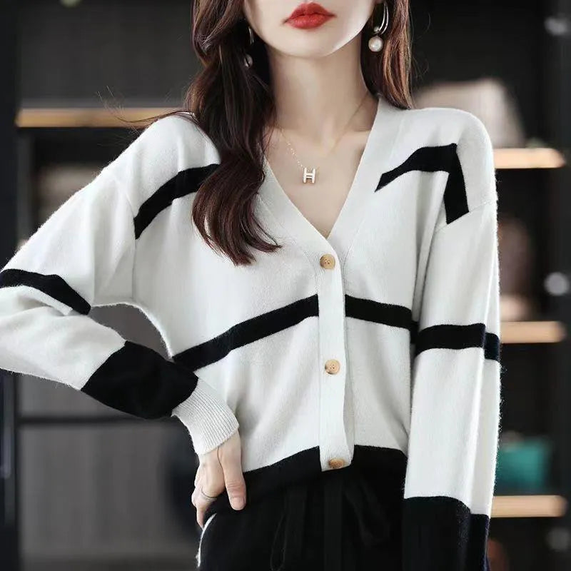 Women's striped V-neck knitted cardigan with 3D pattern in slim fit silhouette