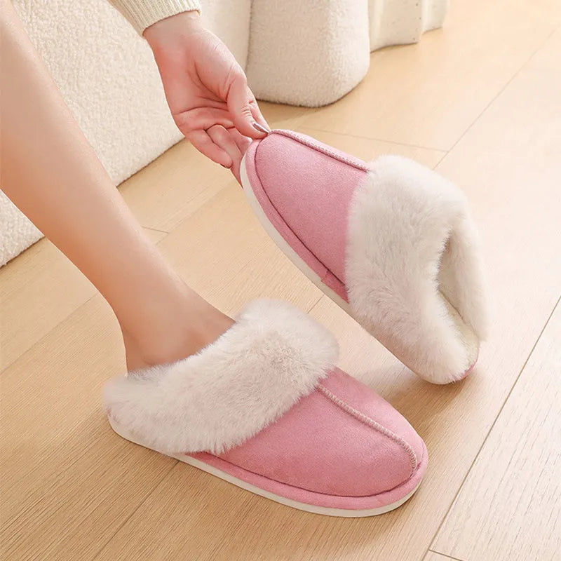 Women's winter plush slippers with round toe design in brown colour showing stitching detail