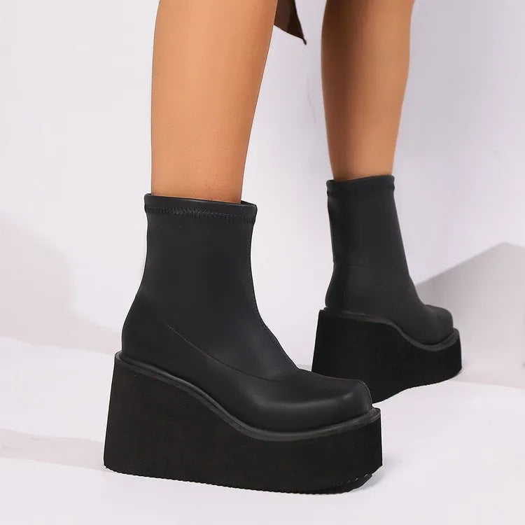 Plus size women's black wedge heel boots with round toe and waterproof platform sole