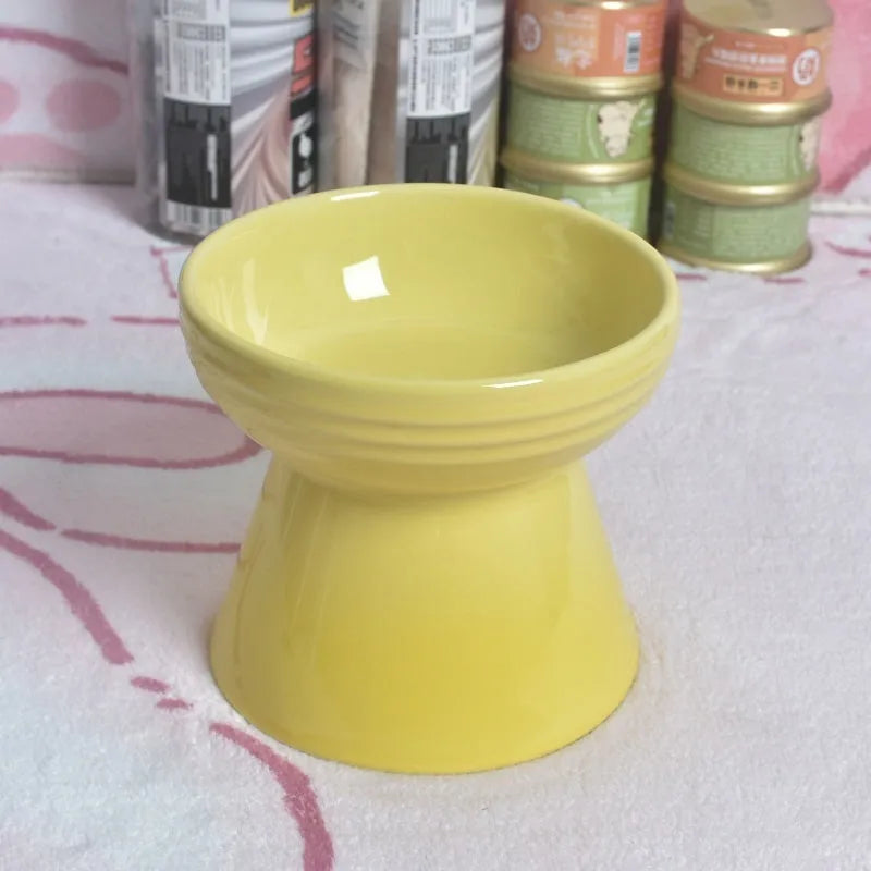 Ceramic pet bowl with anti-tumble design and raised chin support for cats and dogs