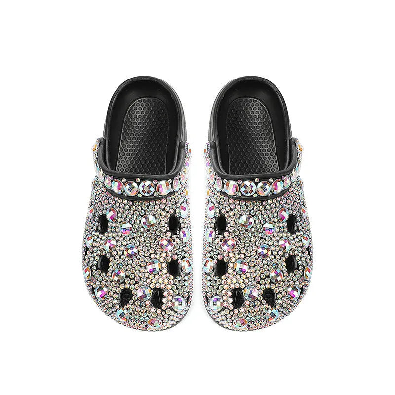 Black women's platform sandals with rhinestone details and a hole-patterned EVA upper.