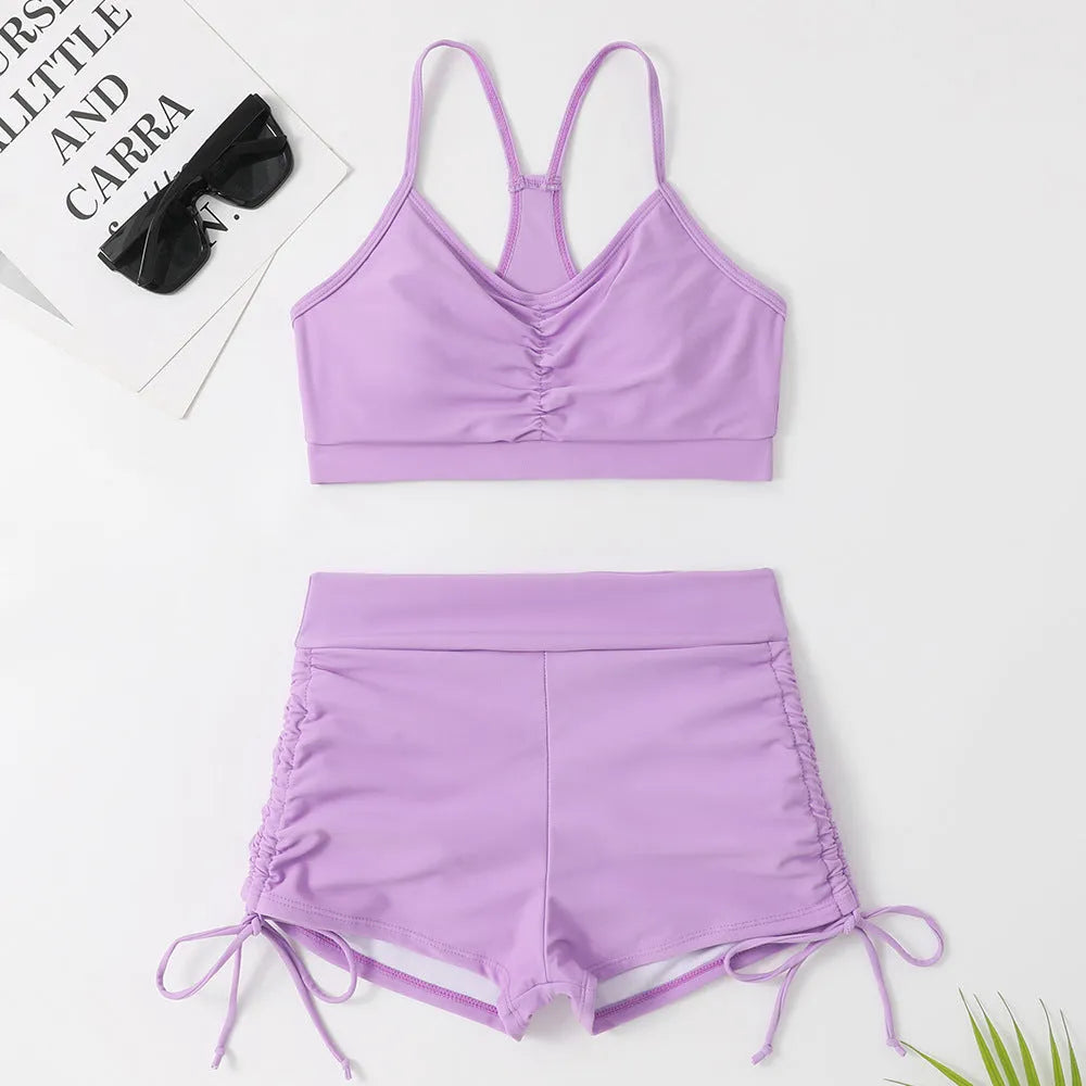 Women's purple high-waist split bikini swimsuit on a mannequin