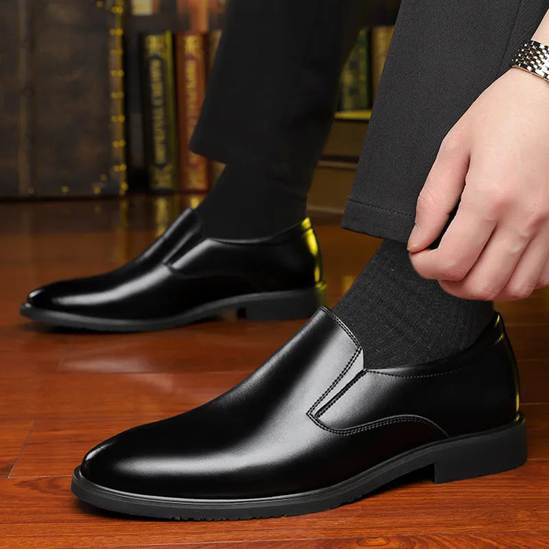 Men's black leather slip-on business casual shoes with rubber sole and low top design
