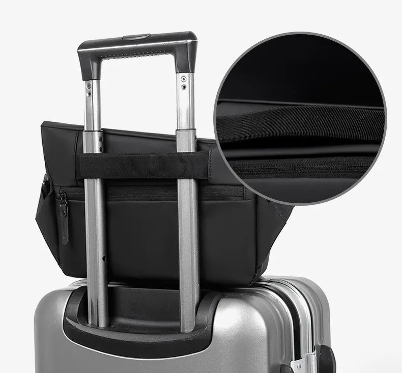 Grey medium square crossbody bag for men showing internal phone and document compartments